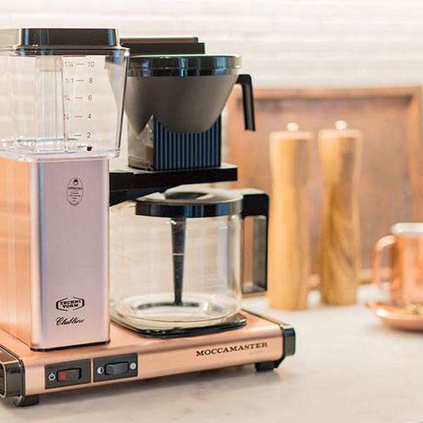 Copper Moccamaster filter coffee brewer on a kitchen counter